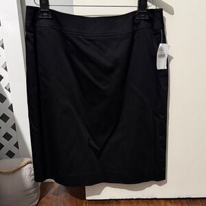 Black women’s pencil line skirt.